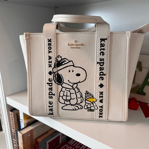 kate spade Handbags - Kate Spade White Leather Snoopy Tote with Black Graphic